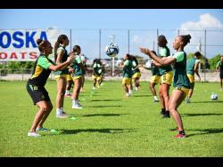 The Reggae Girlz go through a drill during a training session at the Anthony Spaulding Sports Complex on Wednesday morning.