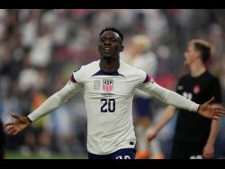 Folarin Balogun of the United States of America celebrates after scoring against Canada during the first half of the Concacaf Nations League final on Sunday in Las Vegas. The USA won 2-0.