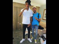 Paul McAllister (right), co-founder of VSR, poses with dancehall artiste Silk Boss. 