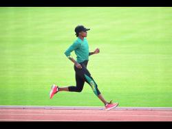 Elaine Thompson Herah goes through her paces during a Jamaica training session in Budapest, Hungary, yesterday.