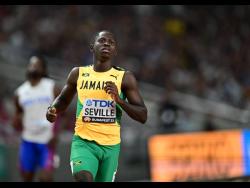 Jamaica’s Oblique Seville eases after easily winning his heat at the World Athletics Championships in Budapest, Hungary today.