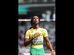 Romaine Beckford celebrates after clearing an earlier height, before being eliminated, at the World Championships in Budapest, Hungary, today.