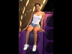 This beauty had the best seat in the house at the Xodus Band launch held  in Kingston recently.