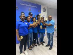 Members of the Hayes PYC who recently won the National PYC Quiz celebrate their victory.