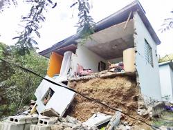 This home in St Thomas was damaged by yesterday’s earthquake.