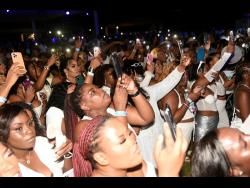 The headline act had the attention of the patrons, who made sure to capture the performance on camera.