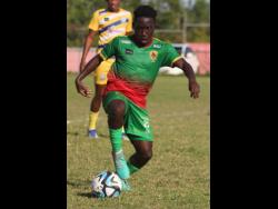 Humble Lion’s Jardel Williams on the ball during the Jamaica Premier League encounter against Molynes United at Effortville Community Centre on Sunday.