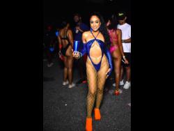 The radiant Mala Morrison, managing director, Gen X carnival band, at Campari Xodus Remedy Glow Edition: Mini Road March, held at Stadium East, St Andrew, on Saturday night.
