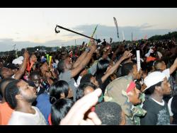 Members of the audience react to a performance at a staging of Sting at Jamworld, Portmore, St Catherine.