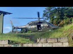 The Jamaica Defence Force helicopter that took Henry to hospital.
