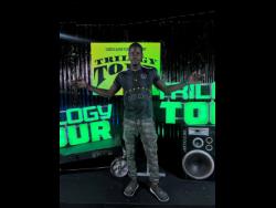 Morrison poses in the installation at the Dexta Daps concert that he says took two hours to create. 