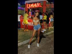 Janne-Marie Ollivierre enjoying the vibe at the recently held Campari Xodus Remedy Glow Edition party at the National Stadium car park in St Andrew.