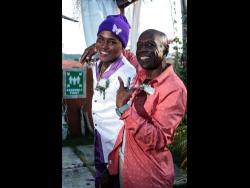 Dancehall artiste AceGawd (left) and his dad Clifford McLarty.