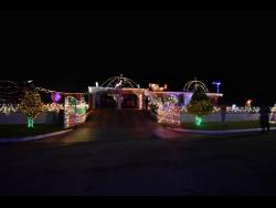 A mesmerising display of Christmas lights transforms this house into a festive wonderland, spreading joy and enchantment throughout the season.
