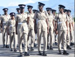 Jamaica National Service Corps graduates at their passing-out parade held at the Polo Grounds, Up Park Camp in Kingston, on Friday. 