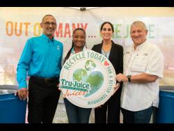 From left: Dr Damien King, chairman, Recycling Partners of Jamaica (RPJ); Candice Ming, marketing manager, RPJ; Lauren Mahfood, marketing manager, Tru-Juice; and Peter McConnell, managing director, Trade Winds Citrus, promote the importance of recycling during the handover ceremony of 600 drums to RPJ from Tru-Juice for recycling across 120 schools. 