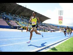 Alphansus Davis High's Alikay Reynolds has a considerable lead on her rivals in the Class Three girls' 800 metres today at the ISSA/GraceKennedy Boys and GIrls' Athletics Championships at the National Stadium. Reynolds won semi-final two in 2:16.51 minutes.