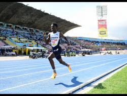 Jamaica College's Cavel Nooks strolls to an easy victory in the Class Three boys' 800 metres semi-final two today at the ISSA/GraceKennedy Boys and Girls' Athletics Championships at the National Stadium. Crooks clocked 2:02.65 minutes.