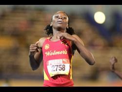 Natrece East of Wolmer's Girls' School relaxes after winning the Class Three girls' 200 metres semi-final in 24.15 seconds at the ISSA/GraceKennedy Boys and Girls' Athletics Championships at the National Stadium today.