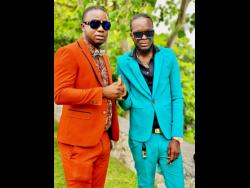 Gary ‘Clapboss’ Richards (left) and dancehall artiste Strykk.