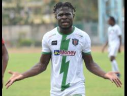 Tivoli Gardens’ Alton Lewis gets angry with the officials during the match.