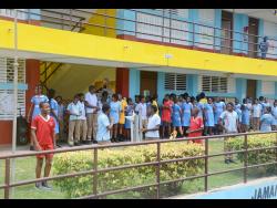Students at Sheffield Primary School, in Westmoreland, engage in their physical exercise session under the Jamaica Moves In School initiative.