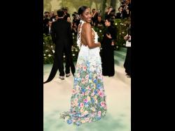 Actress and comedian Ayo Edebiri smiles for the cameras at the recent Met Gala in New York.