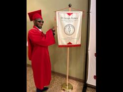 Nigy Boy is pleased with his degrees, that he achieved with honours.