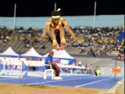 Jaydon Hibbert competing in the men’s triple jump at the Racers Grand Prix at the National Stadium last Saturday.