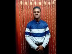 Credit: Photo by Kallejhay Terrelonge Andre Bloomfield is determined to be a positive figure for young boys to emulate.