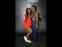 Trina Clarke (left) and Zara Jackson share lens space at last Thursday’s launch of Govana’s  second album, ‘Legacy’, at the Ranny Williams Entertainment Centre in St Andrew.