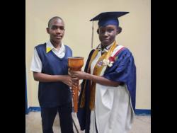 As the top academic achiever, Shanessa Williams was entrusted with passing the torch to Matthew Gallimore, symbolising a legacy of academic excellence at Cedar Grove Academy.