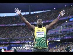 Rajindra Campbell reacts to his throw of 22.15 metres in the men’s shot put final that ultimately earned him a bronze medal. 