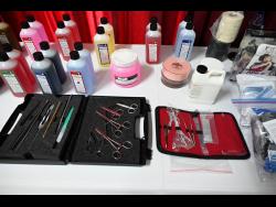 Credit: Photos by Rudolph Brown/Photographer Chemicals and tools of the trade are laid out inside the embalming room.