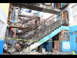 Credit: Contributed The collapsed staircase at the apartment building in Torrington Park, St Andrew.