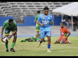 Credit: Ian Allen McGrath High School’s four-goal hero in the semi-finals, Shane Pusey, reacts after scoring against Ocho Rios High at the National Stadium on Wednesday.