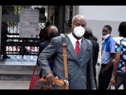 Credit: File In this 2021 photo, attorney-at-law Bert Samuels leaves the courthouse after appearing in a matter.