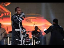 Kyodi engaging in lyrical battle with Fully Bad (in background) at Sting 2023.