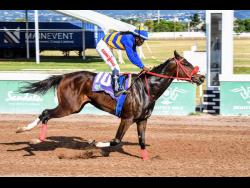 EQUINOX, ridden by Robert Halledeen, winning the sixth race over five furlongs straight at Caymanas Park on Saturday.
