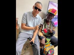 Credit: Tiffany Pryce Mexican reggae artiste Jah Fabio (left) and Jamaican music legend Bongo Herman.