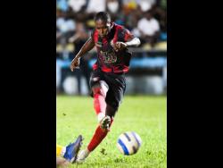 Warner Brown .... scored for Arnett Gardens.