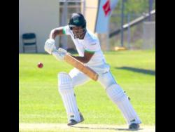 Clarendon Cricket Association opening batsman Randre Christie on the go during his 102 against St Catherine CA in the opening round of the Michael Holding Senior Cup at the Jamalco Sports Club last Saturday.