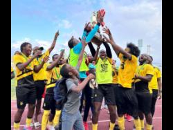 Credit: Ashley Anguin/Photographer Flanker United FC celebrate by lifting the 2025 St James/Sandals Resorts International Major League trophy during the post-match presentation ceremony at Montego Bay Sports Complex on Sunday. Flanker defeated Reggae Youths 1-0.