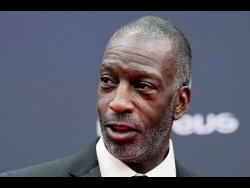 Former United States sprinter Michael Johnson arrives at the Laureus Sports Awards ceremony in Madrid, Monday, April 22, 2024.