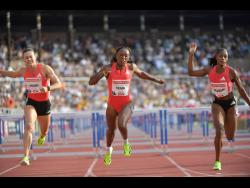 From left: Dutchwoman Nadine Visser, the United States’ Grace Stark, and Jamaica’s Ackera Nugent go to the line in the 100-metre hurdles at the Wanda Diamond League meeting in Stockholm, Sweden on Sunday.