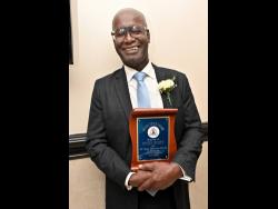 Credit: Rudolph Brown Dr Owen Scott, who has served in education for 49 years, was honoured at the Jamaica Teachers’ Association (JTA) Golden Torch Award Ceremony, held at The Jamaica Pegasus hotel in New Kingston on Friday.