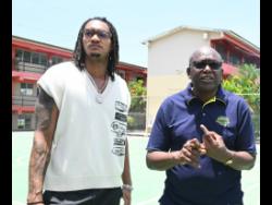 Credit: Ashley Anguin San Antonio Spurs’ Devin Vassell (left) and President of the Jamaica Basketball Association (JaBA), Paulton Gordon, in conversation during the recent Devin Vassell Basketball Clinic at Herbert Morrison Technical High School in Montego Bay, St James.