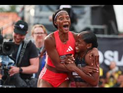 Ackera Nugent (left) celebrating with Megan Tapper