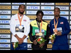 Credit: Gladstone Taylor From left: Medallists in the men’s 400m Matthew Hudson-Smith of Great Britian (silver), World champion Antonio Watson of Jamaica (gold) and Quincy Hall (bronze) of the United States during the evening session of the 2023 World Athletics Championships held at the National Athletics Centre in Budapest, Hungary on Friday, August 25, 2023.