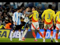 Colombia’s Richard Rios (right) is constrained by Argentina’s Nicolas Otamendi (second left) during a qualifying match for the 2026 FIFA World Cup at the Monumental Stadium in Buenos Aires, Argentina on June 10, 2025.